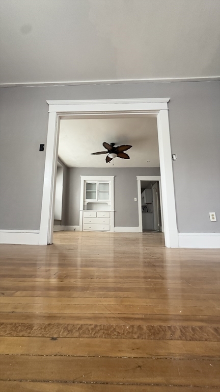 42-44 Narragansett Street, Unit 1 Springfield, MA 01107 - Photo 6 of 10 a view of an empty room with window and wooden floor