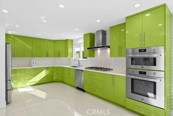 a kitchen with lots of counter space and a sink