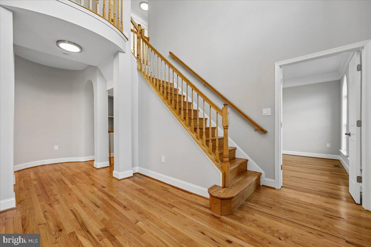 21712 Slidell Road Boyds, MD 20841 - Photo 5 of 32 a view of entryway and hall with wooden floor