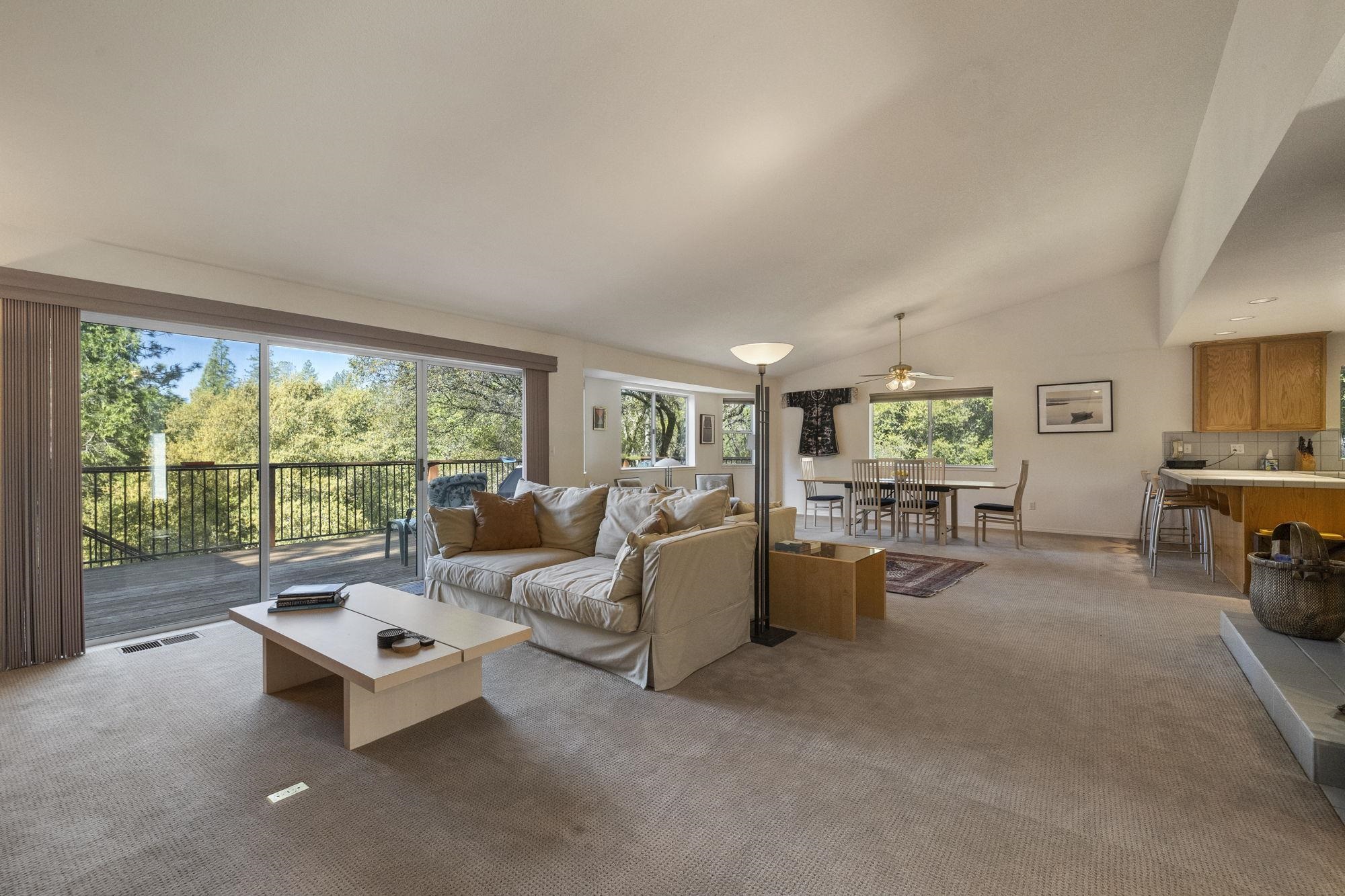 19099 Raboul Court Groveland, CA 95321 - Photo 6 of 58 a living room with furniture and a floor to ceiling window