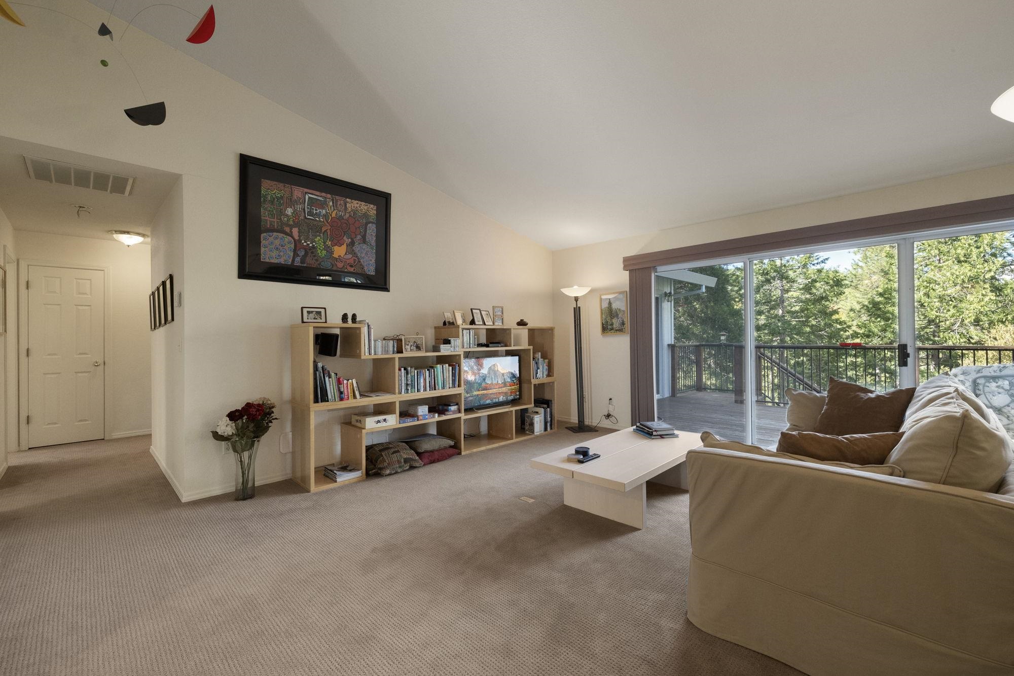 19099 Raboul Court Groveland, CA 95321 - Photo 8 of 58 a living room with furniture and a large window