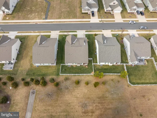 a picture of a room with a white wall and a picture