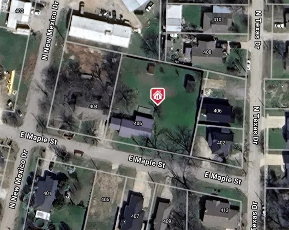 an aerial view of a house with garden