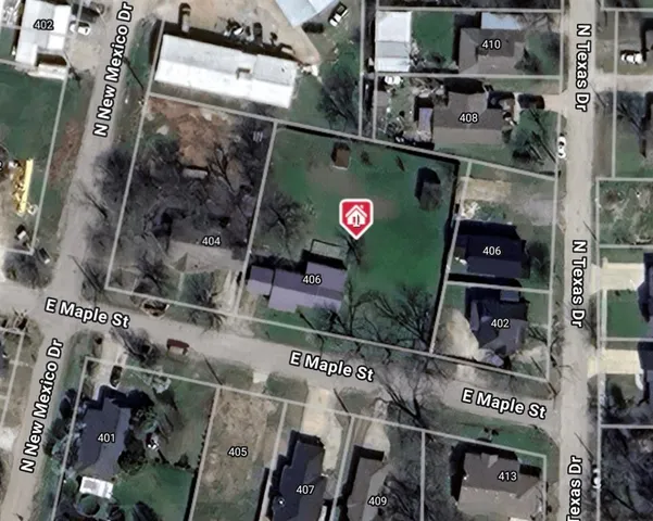 an aerial view of a house with garden