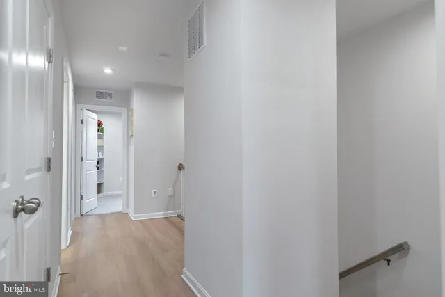 a view of hallway with livingroom