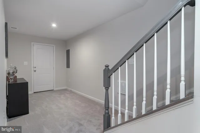 a view of an entryway with stairs