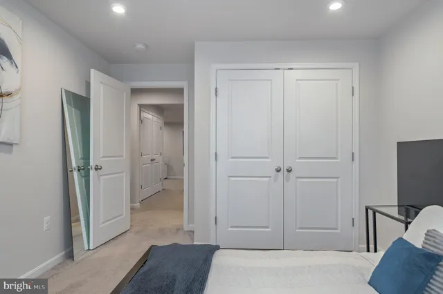a workspace with furniture and a ceiling fan