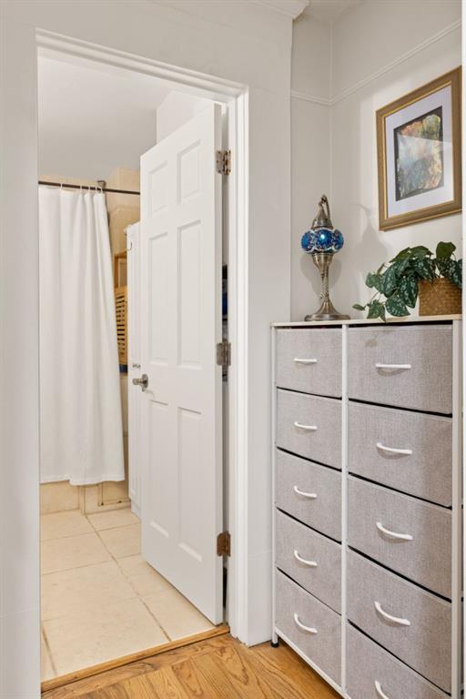 259 14th Street Northeast, Unit B103 Atlanta, GA 30309 - Photo 15 of 33 a view of a closet with wooden floor