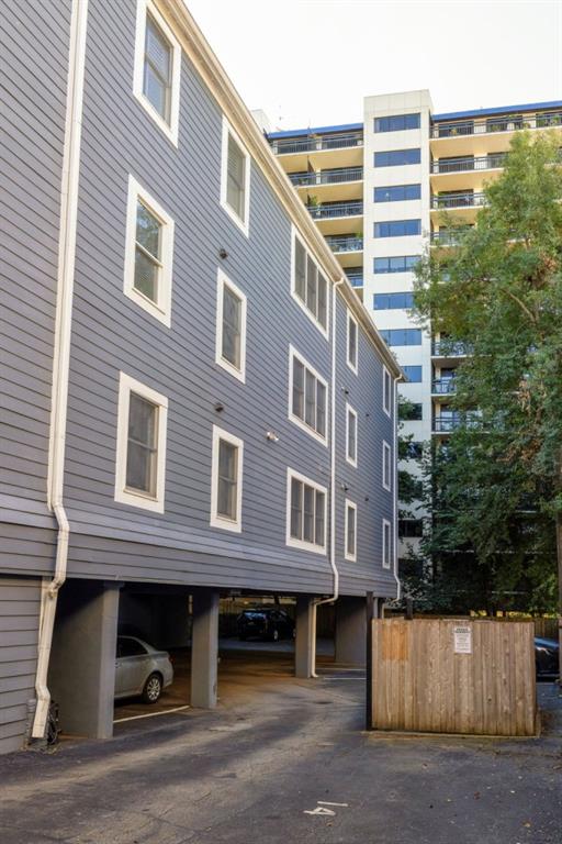 259 14th Street Northeast, Unit B103 Atlanta, GA 30309 - Photo 19 of 33 a view of a building with a street