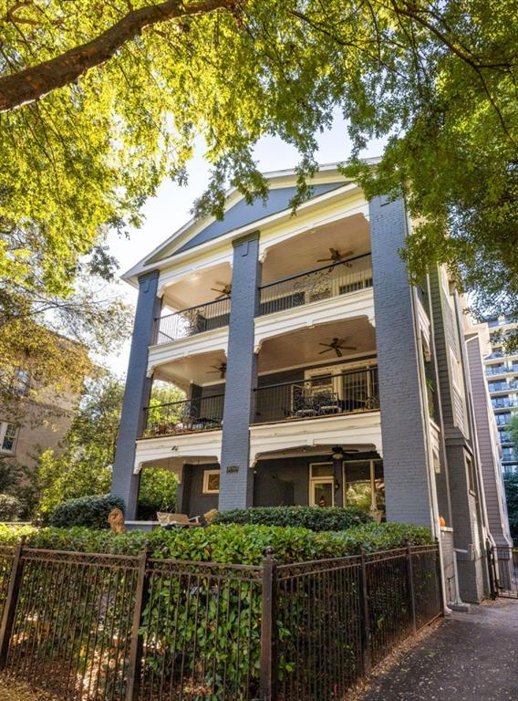 259 14th Street Northeast, Unit B103 Atlanta, GA 30309 - Photo 21 of 33 a front view of a building with balcony