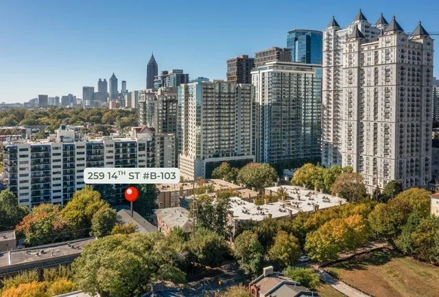a view of city with tall buildings