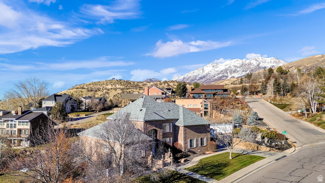 1085 Windsor Drive Provo, UT 84604 - Photo 71 of 83 Aerial view of residential area with mountains