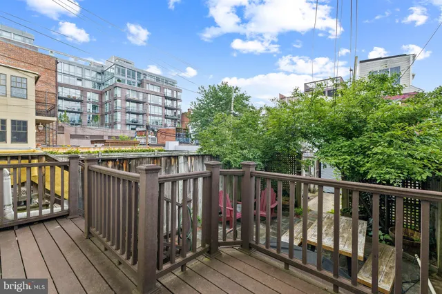 a view of buildings from a balcony