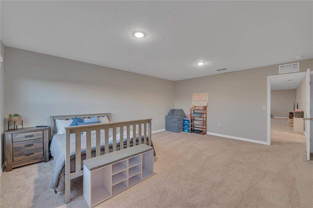 12710 Hysmith Loop Parrish, FL 34219 - Photo 24 of 45 a view of a hallway with workspace and a window