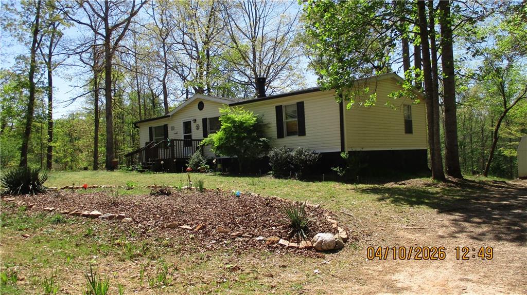 5507 Hemlock Court Lula, GA 30554 - Photo 7 of 8 a view of a house with a yard