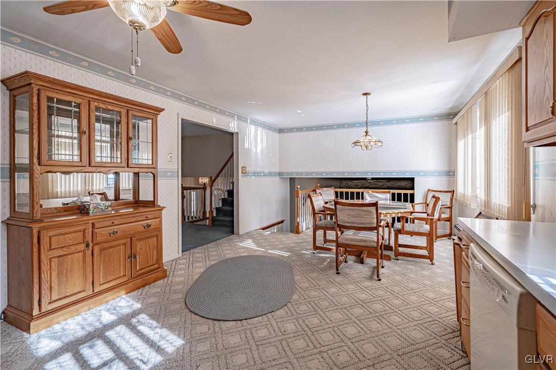 551 Birch Road Hazleton, PA 18202 - Photo 14 of 44 a living room with furniture a dining table and kitchen view