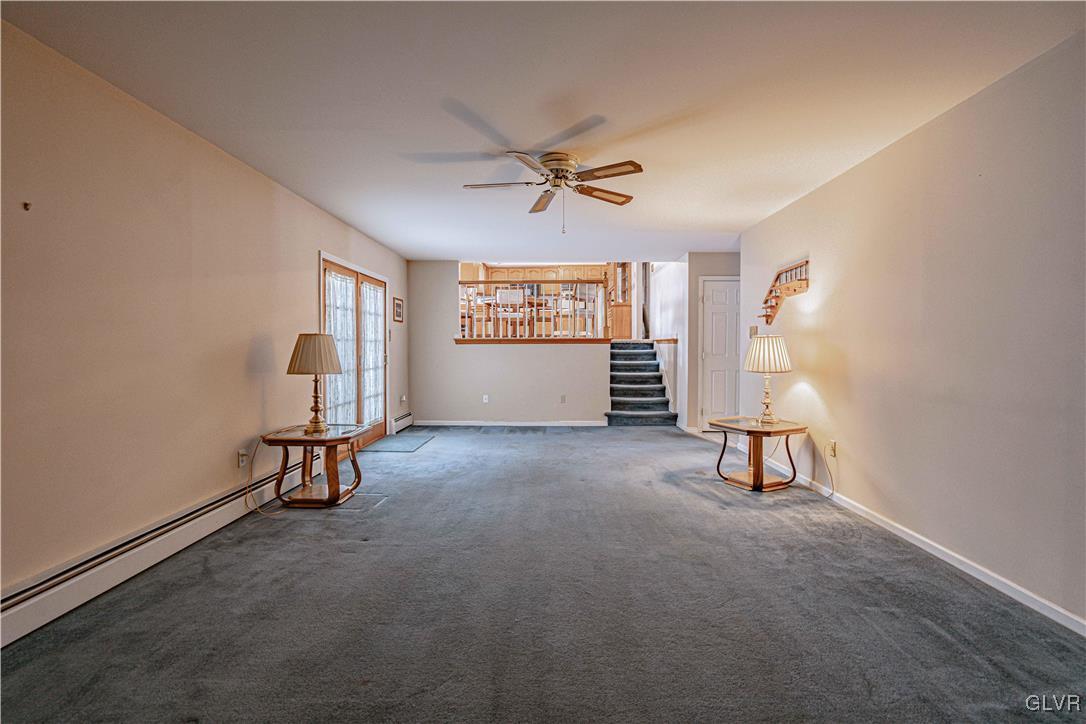 551 Birch Road Hazleton, PA 18202 - Photo 19 of 44 an empty room with windows and fan