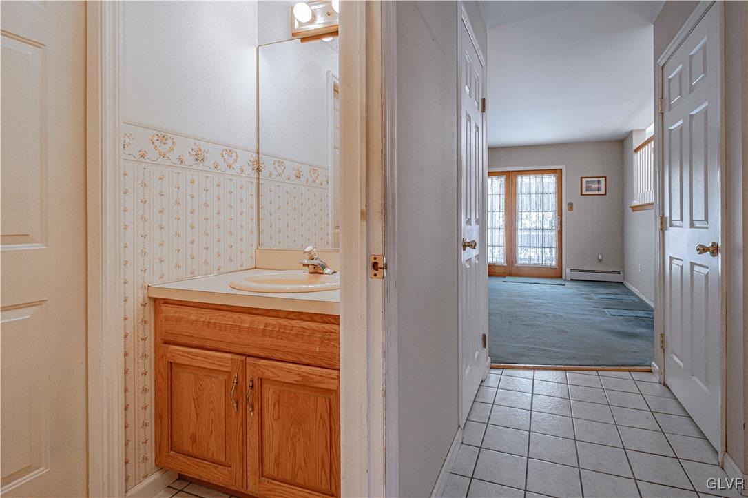 551 Birch Road Hazleton, PA 18202 - Photo 20 of 44 a view of a hallway with closet and wooden floor