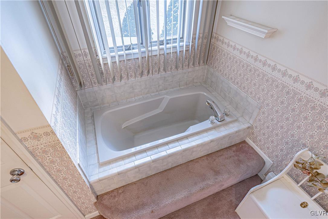 551 Birch Road Hazleton, PA 18202 - Photo 22 of 44 a bathroom with a tub and a window