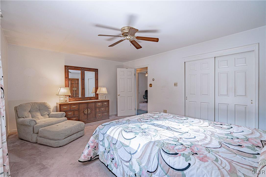 551 Birch Road Hazleton, PA 18202 - Photo 27 of 44 a bedroom with a bed and wooden floor