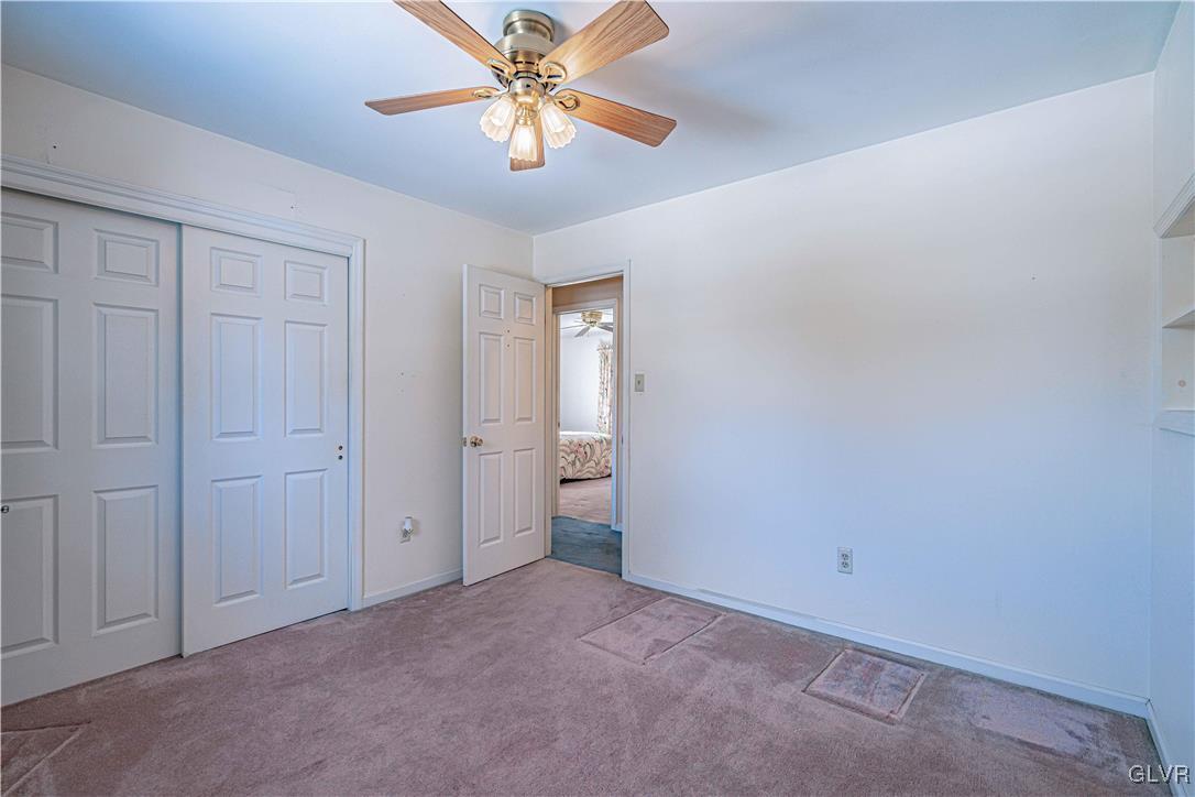 551 Birch Road Hazleton, PA 18202 - Photo 30 of 44 an empty room with windows and fan