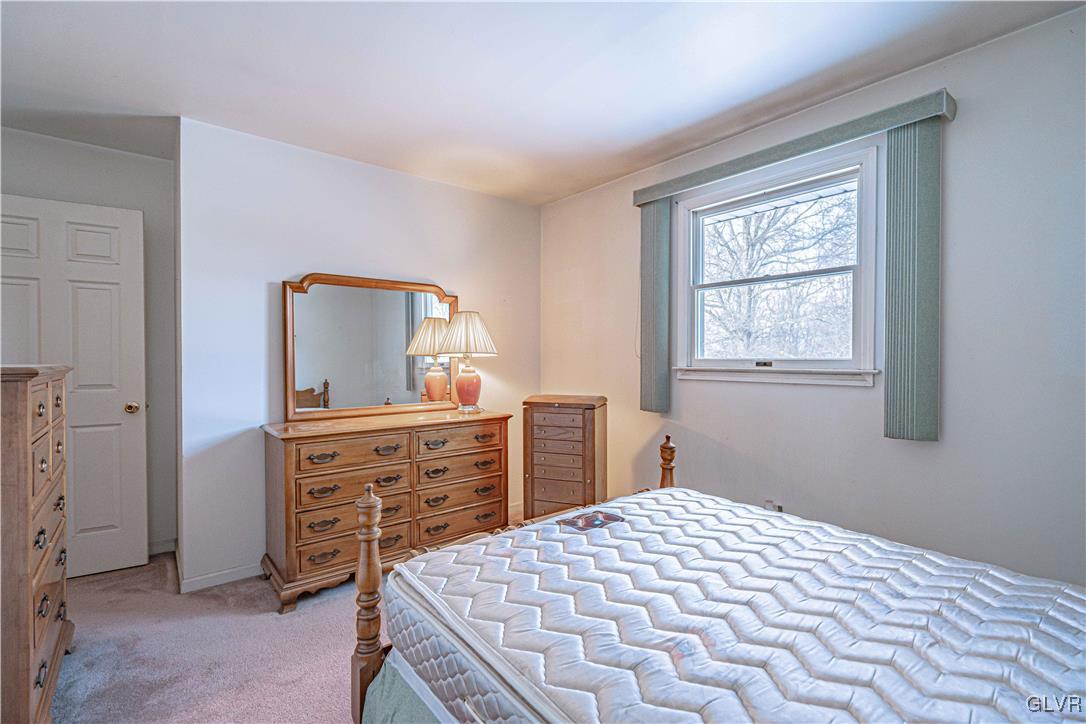 551 Birch Road Hazleton, PA 18202 - Photo 32 of 44 a bedroom with a bed and a dresser