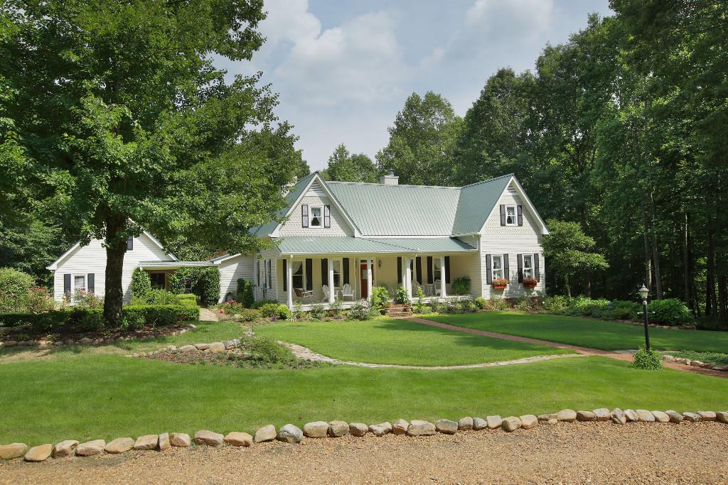 4082 Arbor Hill Road Canton, GA 30115 - Photo 1 of 1 Step back in time in this gorgeous home that is a replica of an 1880's Georgia Farmhouse. Vintage details throughout updated seamlessly with modern amenities.