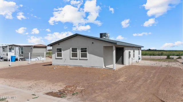 a view of a house with a patio