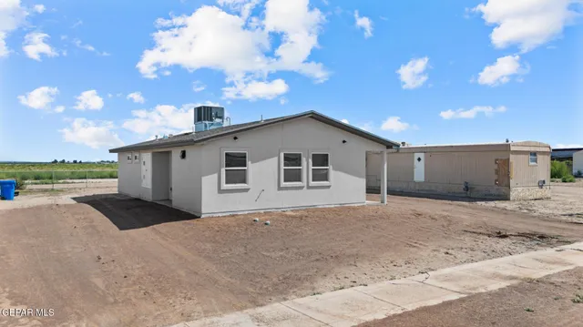 a view of a house with a patio