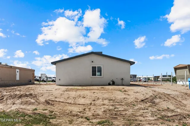 a view of a house with a patio