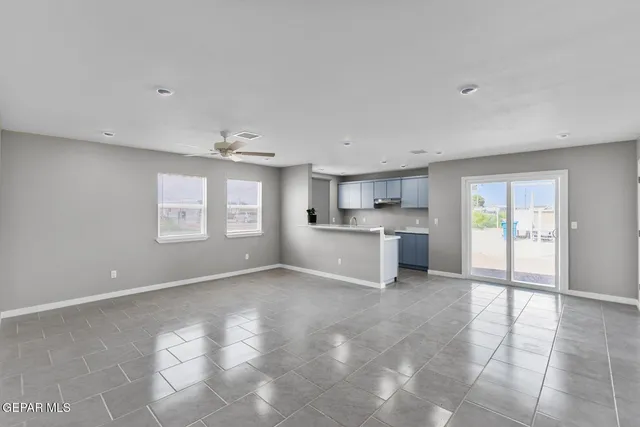 a view of kitchen and windows