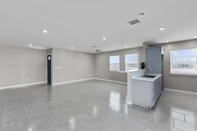 a view of a kitchen with a sink
