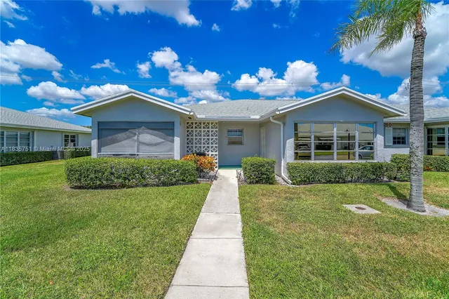 a view of house with outdoor space and porch