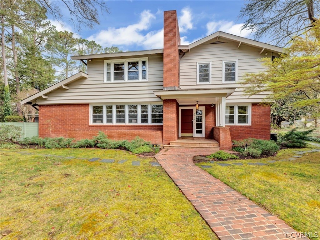 8010 Thom Road Henrico, VA 23229 - Photo 1 of 50 a front view of a house with garden