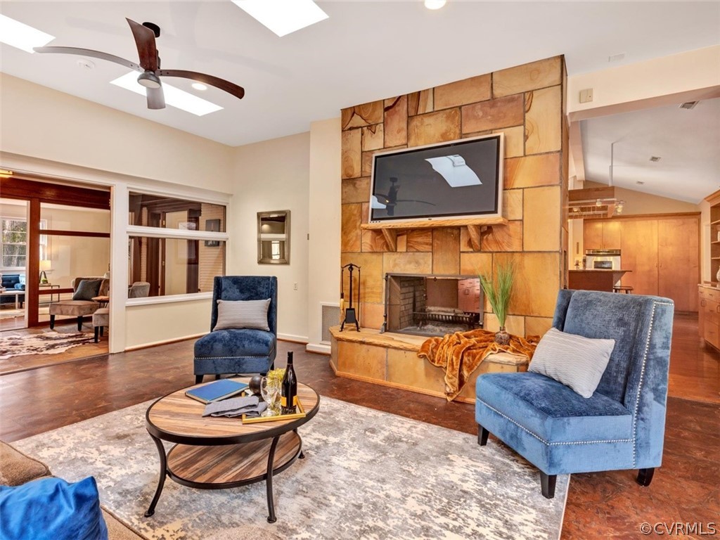 8010 Thom Road Henrico, VA 23229 - Photo 13 of 50 a living room with fireplace furniture and a large window