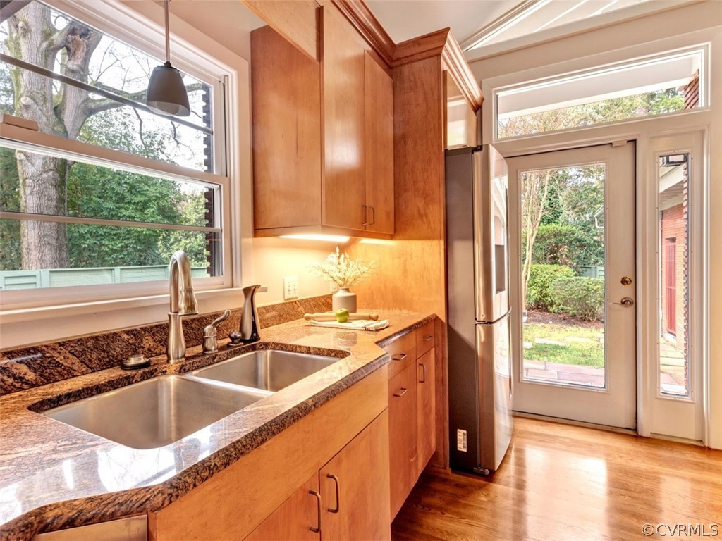 8010 Thom Road Henrico, VA 23229 - Photo 19 of 50 a kitchen with a sink and a large window