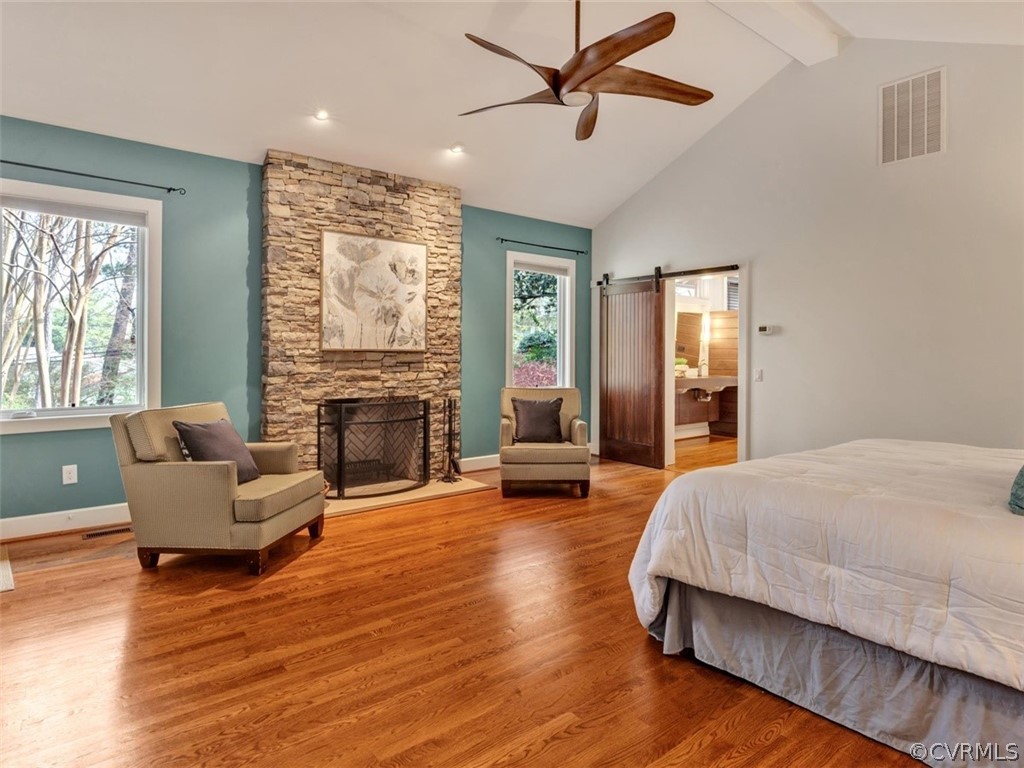 8010 Thom Road Henrico, VA 23229 - Photo 27 of 50 a spacious bedroom with a bed and a fireplace