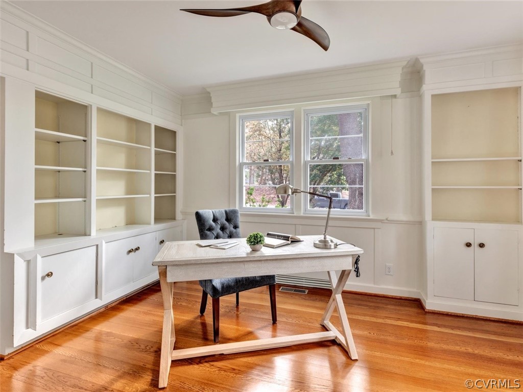 8010 Thom Road Henrico, VA 23229 - Photo 35 of 50 a view of a workspace with furniture and a window