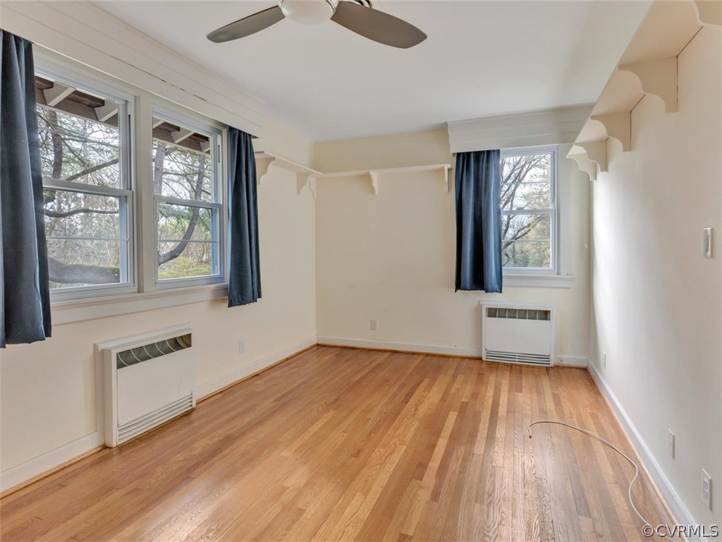 8010 Thom Road Henrico, VA 23229 - Photo 37 of 50 a view of an empty room with wooden floor and a window