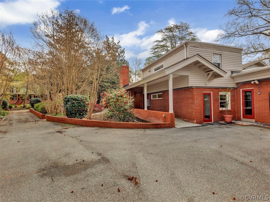 8010 Thom Road Henrico, VA 23229 - Photo 46 of 50 a view of a house with a street