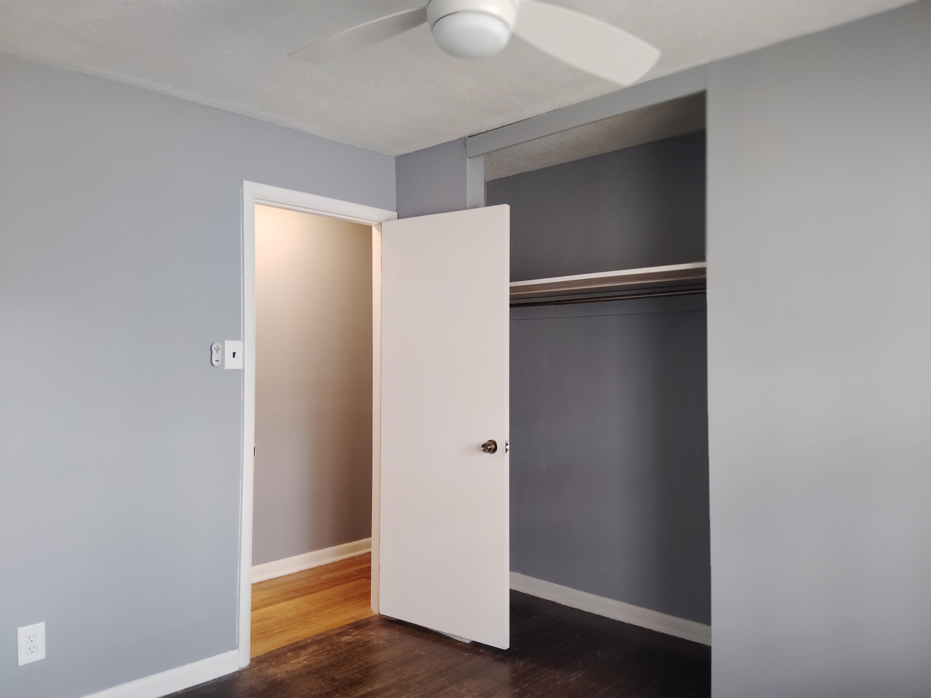 4307 Sidney Road Memphis, TN 38116 - Photo 18 of 18 Unfurnished bedroom featuring dark wood-type flooring, a ceiling fan, and a closet
