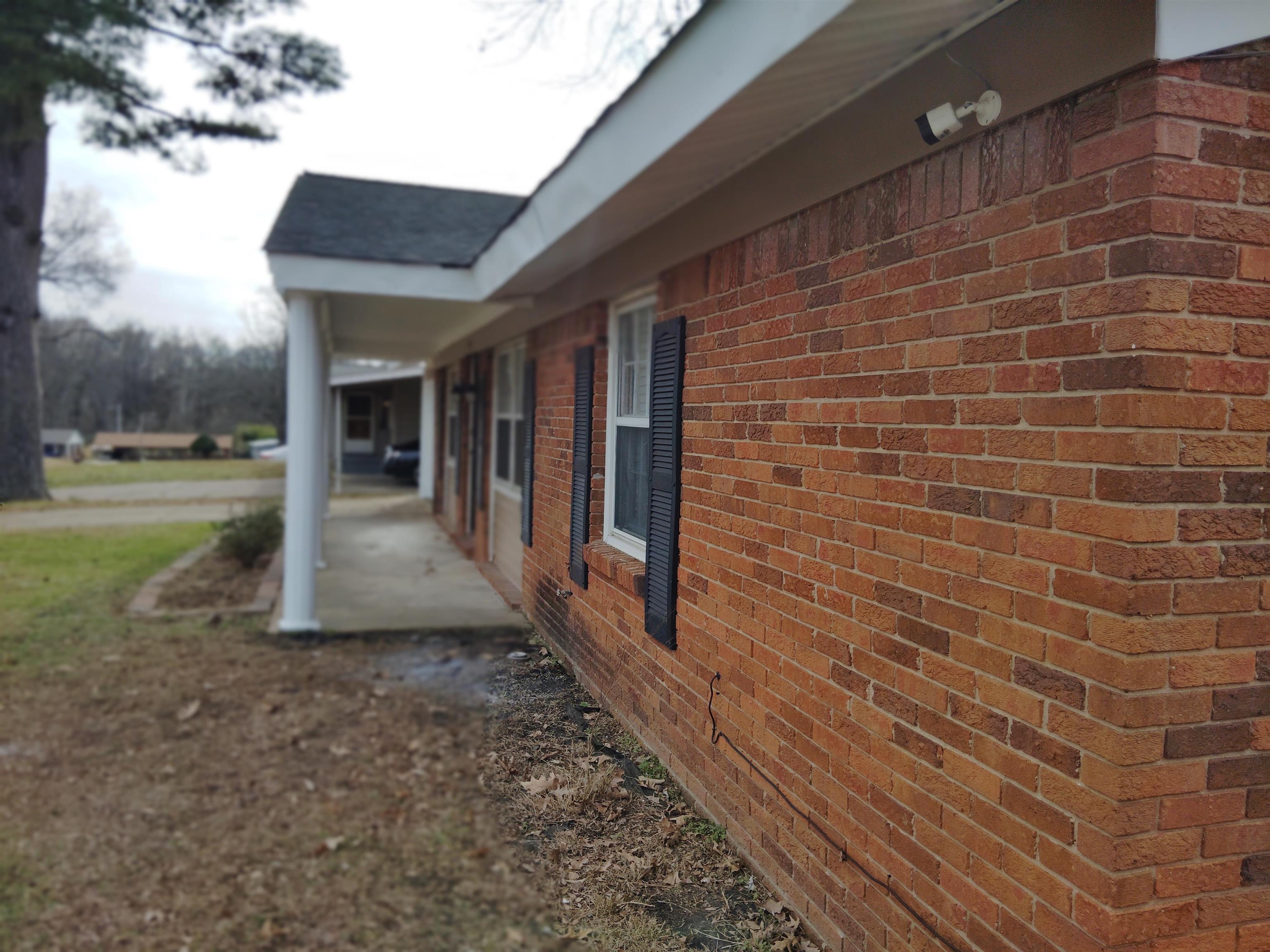 4307 Sidney Road Memphis, TN 38116 - Photo 3 of 18 View of home's exterior featuring brick siding