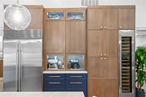 a bathroom with a mirror and a shower