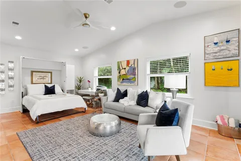 a living room with furniture and a couch