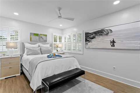 a bed room with a bed and a window