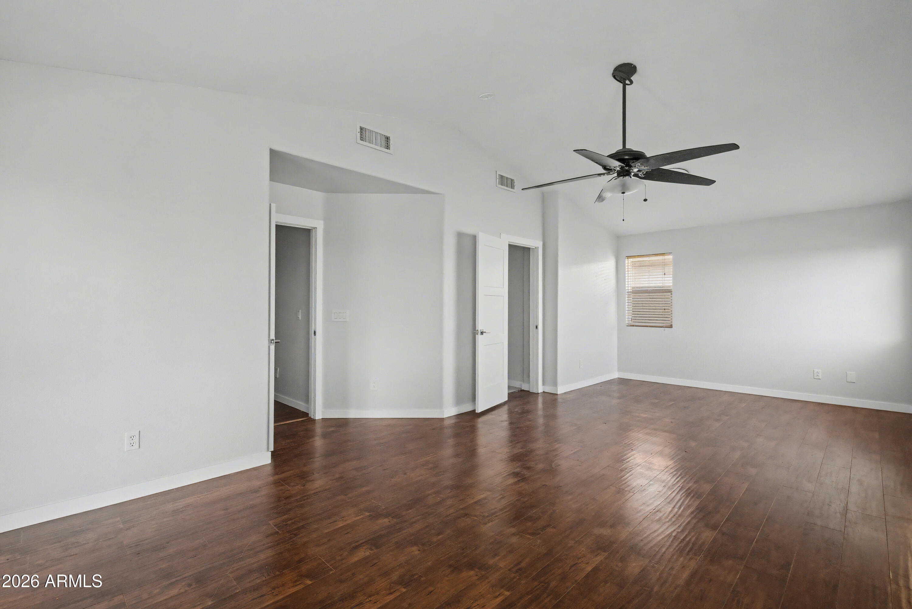 3925 West Charter Oak Road Phoenix, AZ 85029 - Photo 22 of 39 a view of an empty room with a window