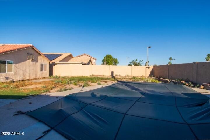 3925 West Charter Oak Road Phoenix, AZ 85029 - Photo 30 of 39 a view of a terrace with wooden fence