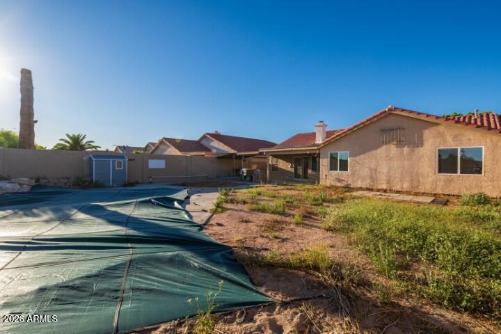 3925 West Charter Oak Road Phoenix, AZ 85029 - Photo 31 of 39 a view of a house with a yard