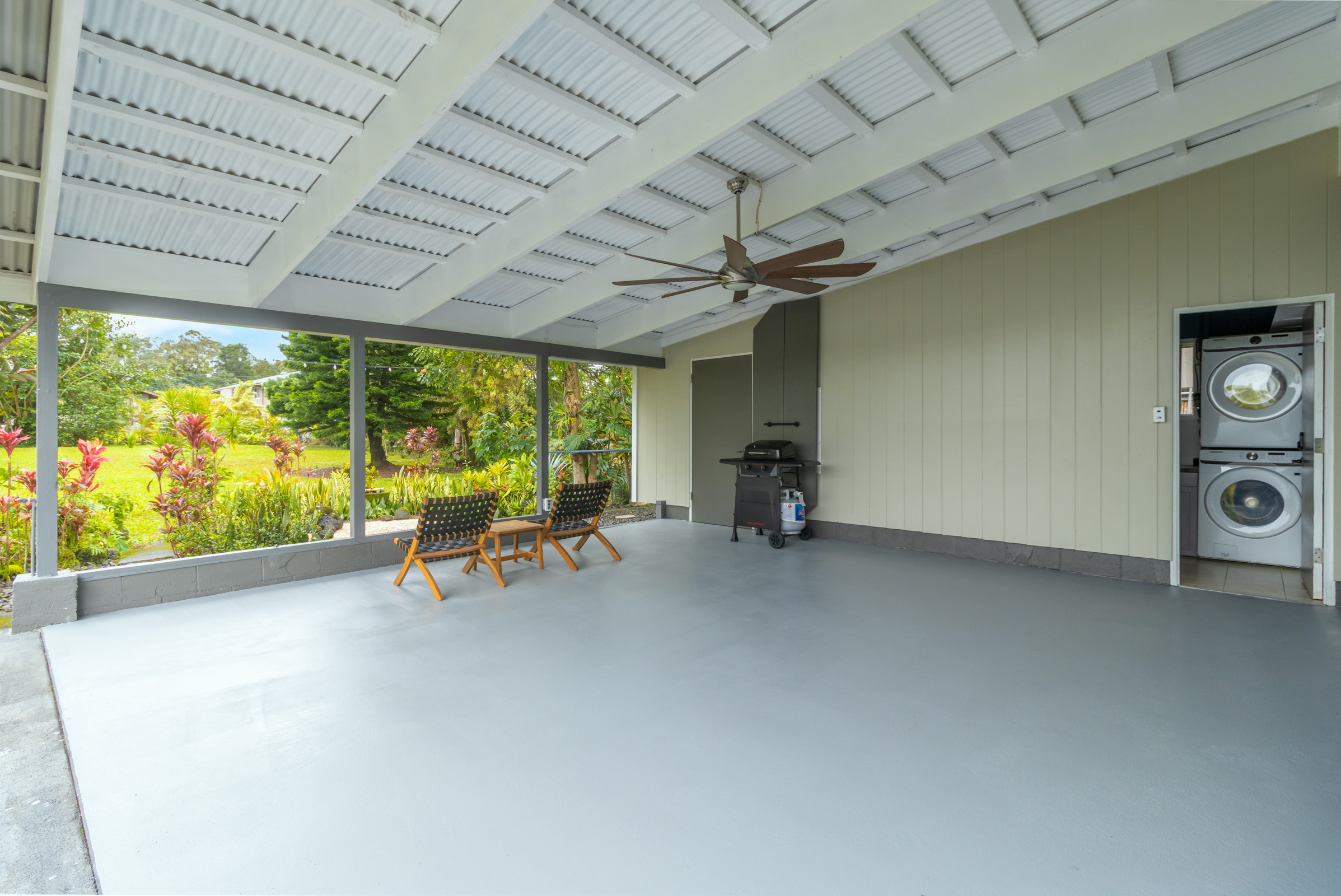110 Malia Street Hilo, HI 96720 - Photo 17 of 27 a view of a room with a large window and sitting area