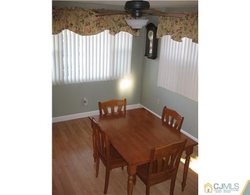 22 Kenmore Road Edison, NJ 08817 - Photo 6 of 11 a view of a workspace with furniture